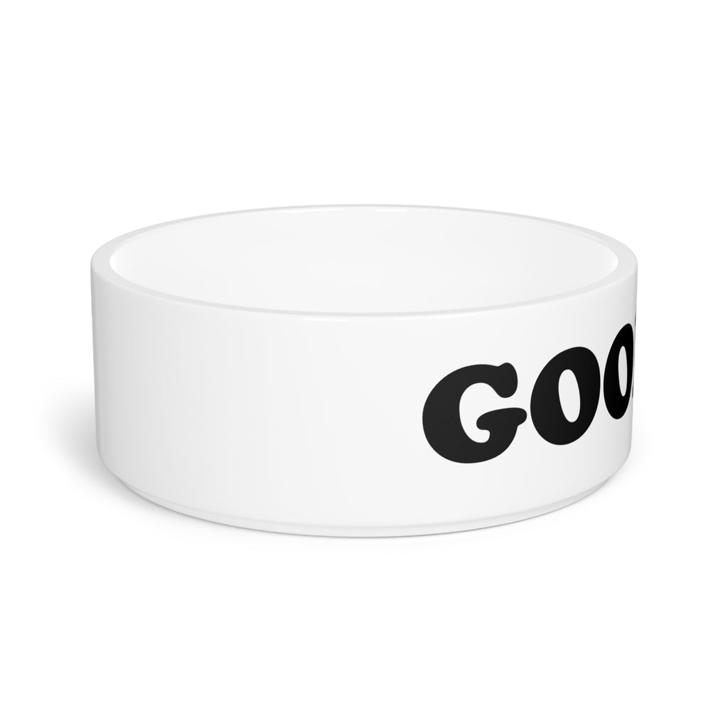 Curved metallic object on a white background